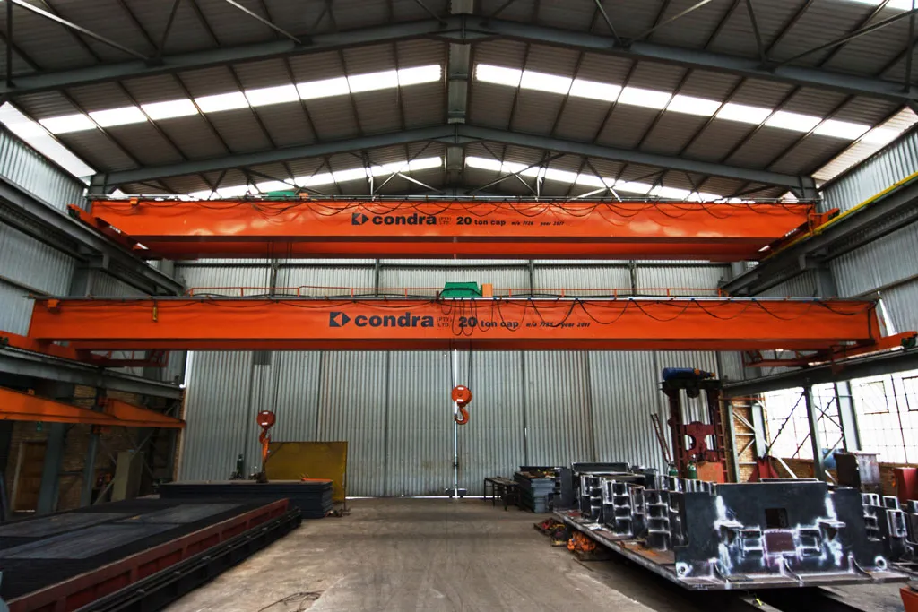 Production area with overhead cranes and machine tools